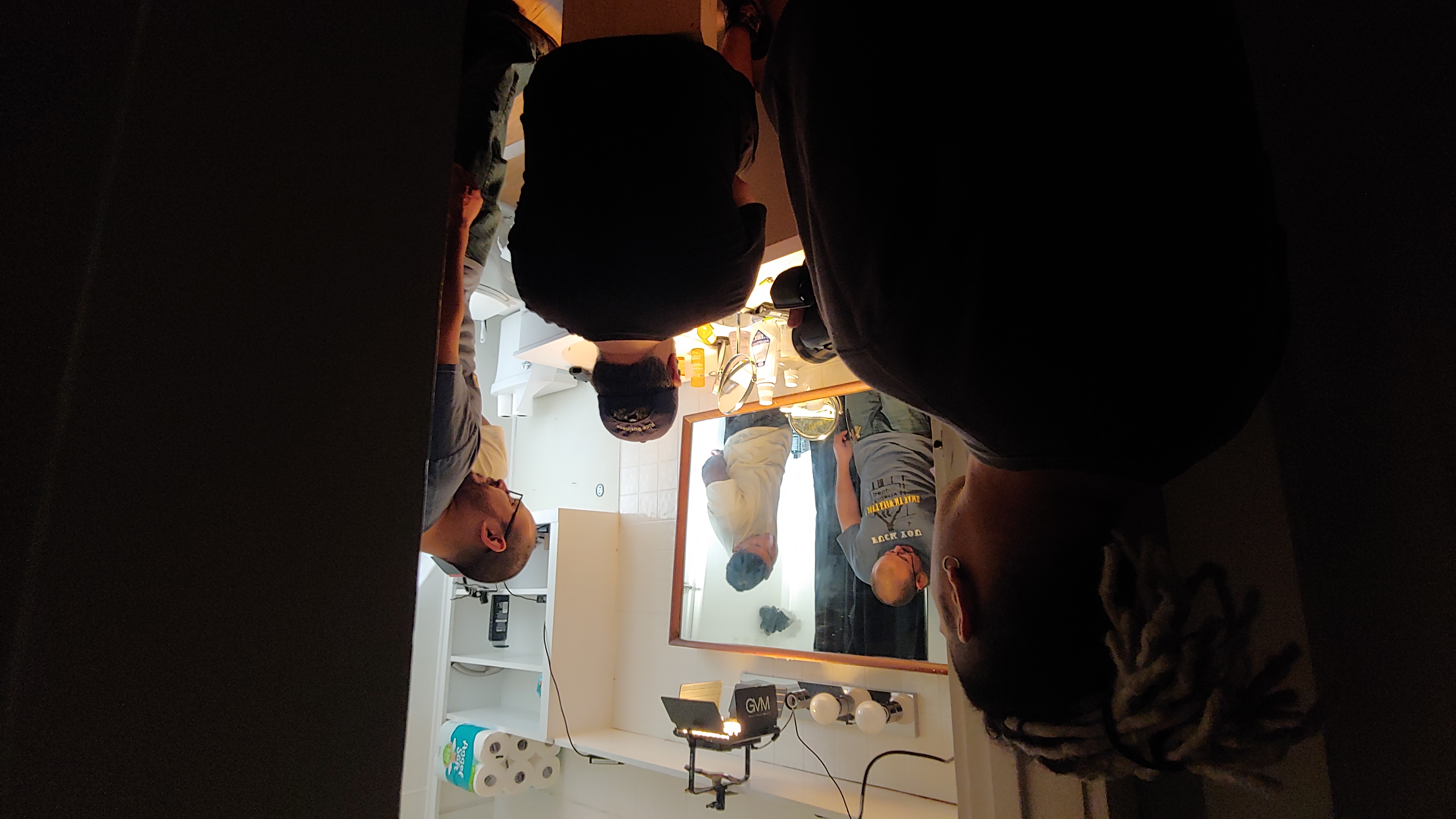 Site Factor Productions reviewing video on production set